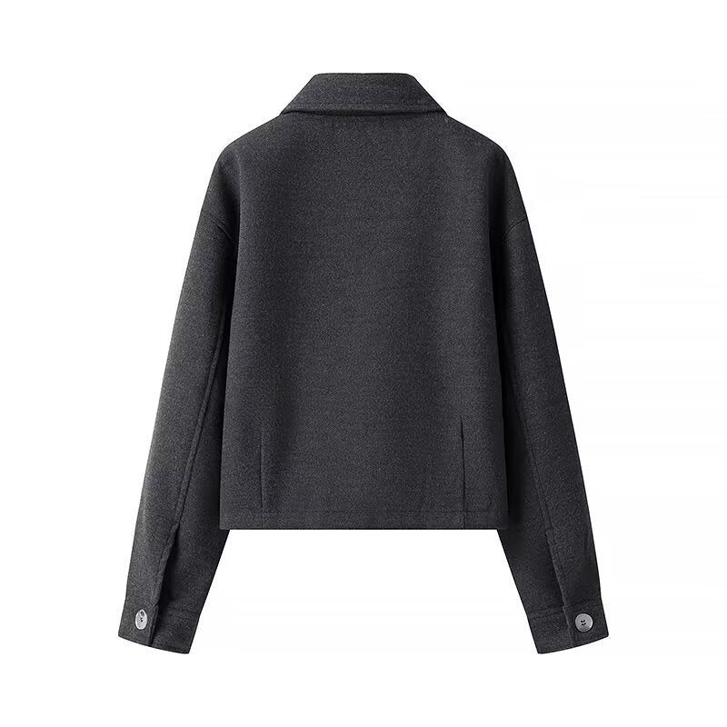 Women's tailored cropped blouson jacket in shirt collar style with concealed zipper front and large appliquéd pockets Mune Fashion