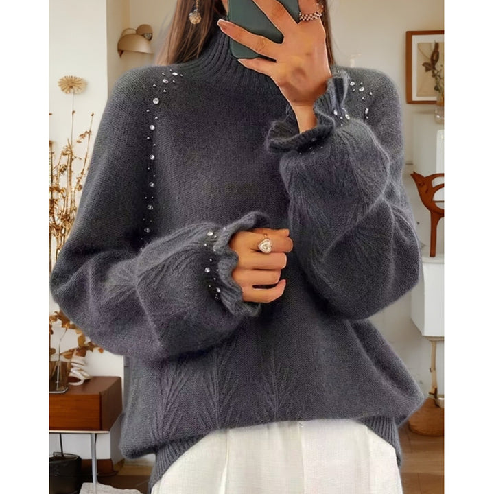 Ladies oversized knit sweater with stand-up collar and pearl details Mune Fashion