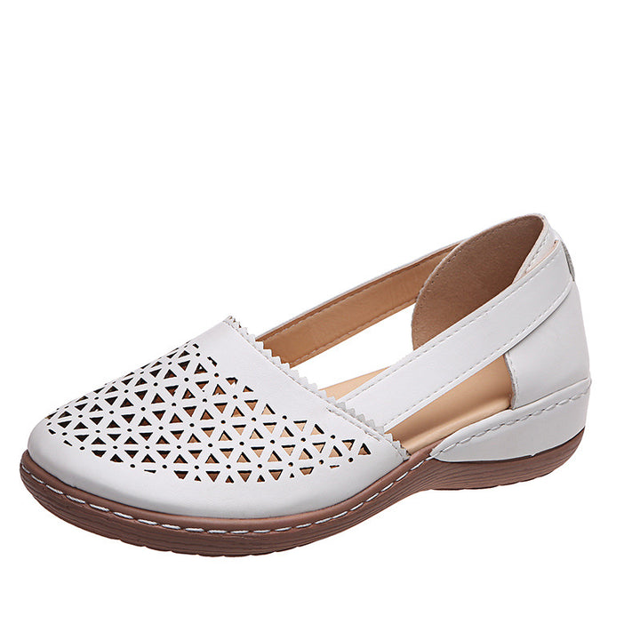 Women's perforated slipper pumps with side cut-outs, elastic heel strap, and cushioning comfort sole Mune Fashion