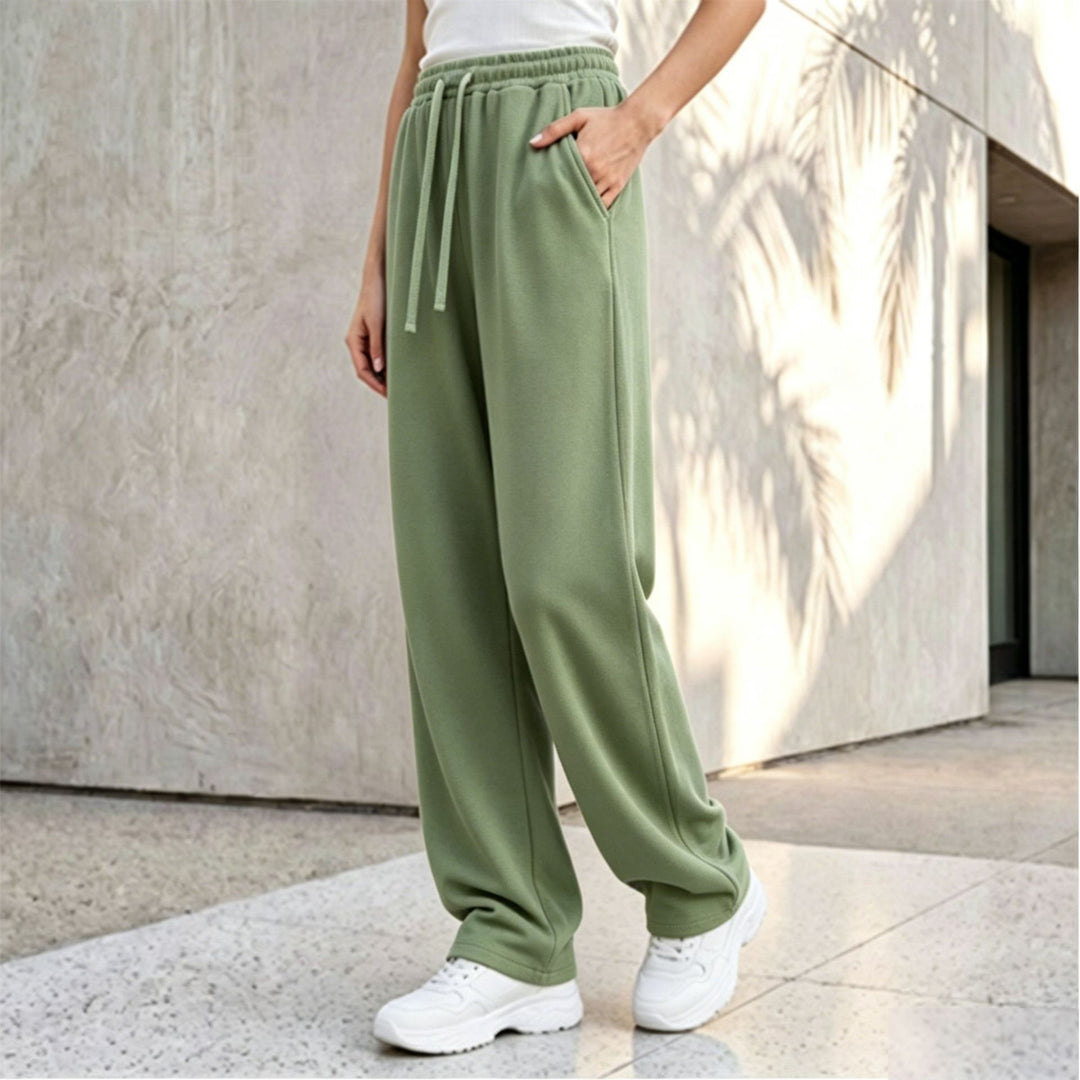Women's wide lounge palazzo pants with high comfort waistband, drawstring, side pockets, and decorative side seam Mune Fashion