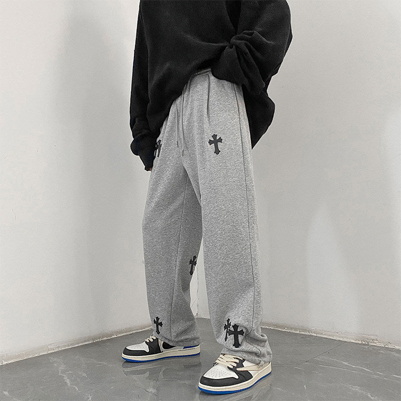 Men's wide cotton jogging pants with all-over cross print and elastic drawstring waistband Mune Fashion