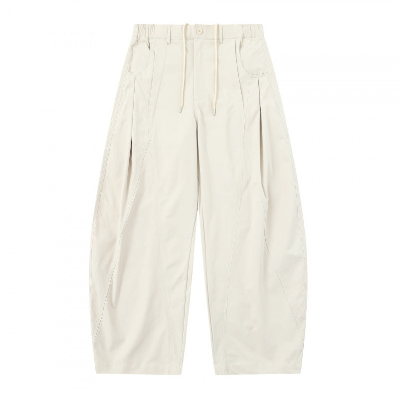 Women's wide balloon pants with drawstring waistband, pleats, and patch side pockets Mune Fashion