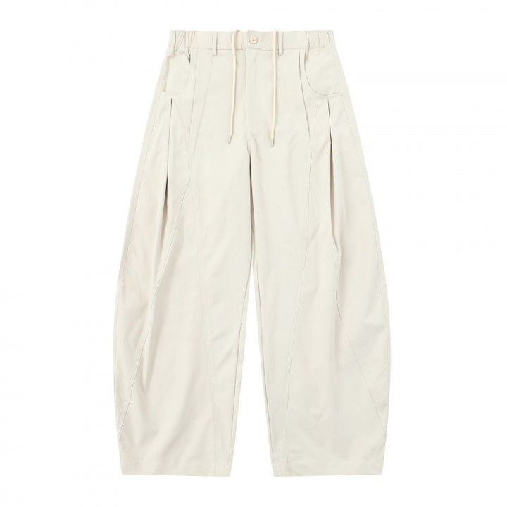 Women's wide balloon pants with drawstring waistband, pleats, and patch side pockets Mune Fashion