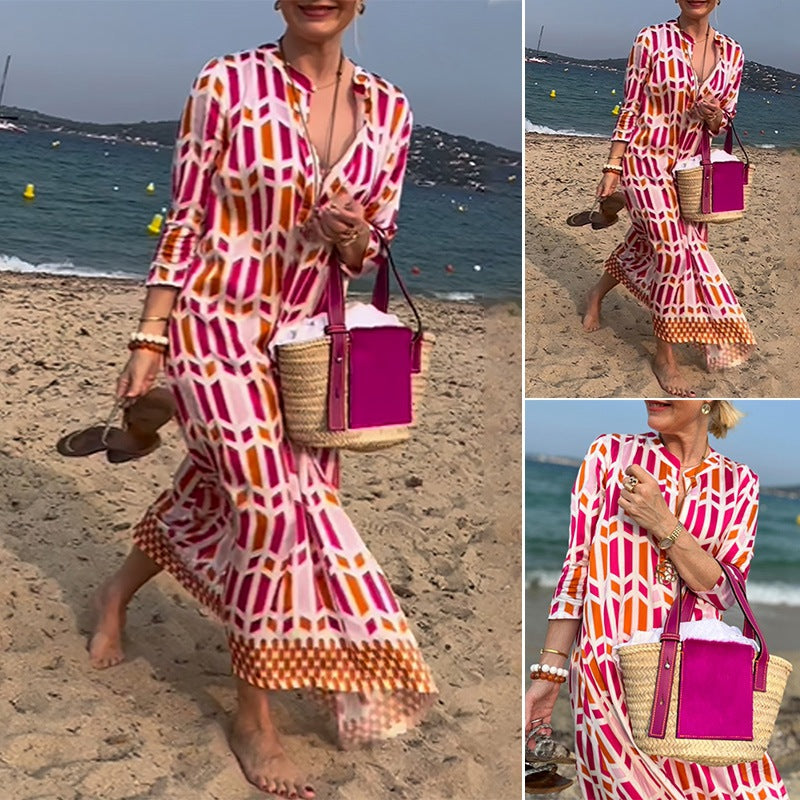 Women's flowing maxi dress with graphic all-over print, V-neck and three-quarter sleeves Mune Fashion