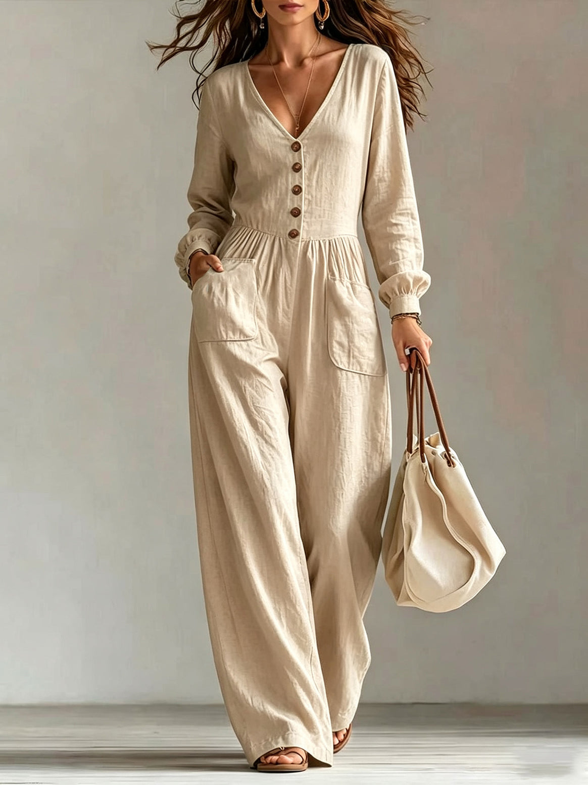 Ladies linen jumpsuit with V-neck, button placket and wide leg cut Mune Fashion