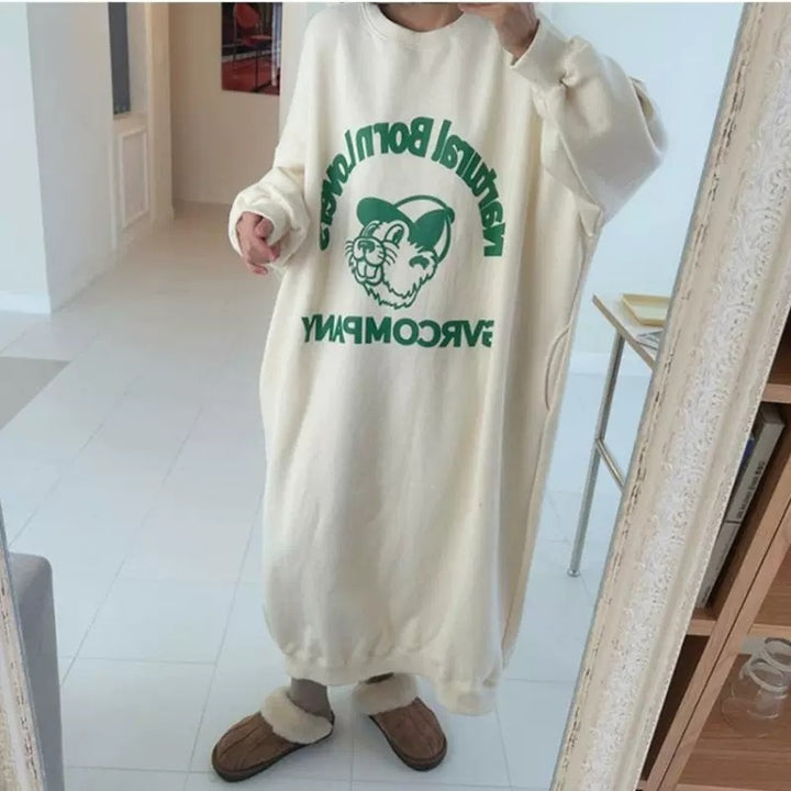 Women Long Fleece Sweat Dress with Statement Print, Side Pockets and Elastic Hem Mune Fashion