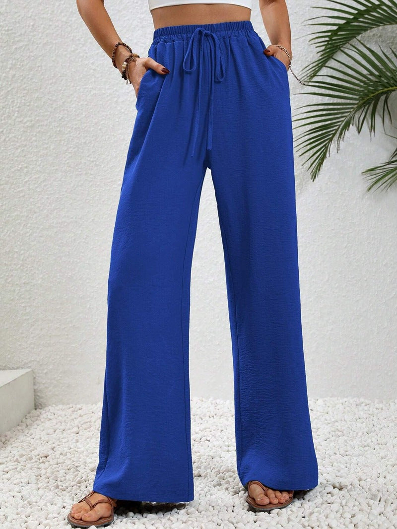 Ladies lightweight, loose-fitting beach pants with elastic waistband, drawstring and side pockets Mune Fashion
