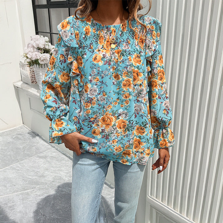 Women's floral chiffon blouse with ruched yoke, ruffle sleeves, and relaxed fit Mune Fashion
