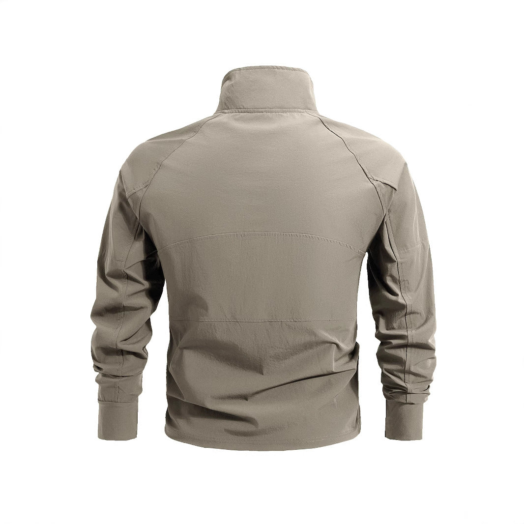 Men's lightweight tactical zip pullover with high collar, shoulder flaps, and concealed zip pockets.