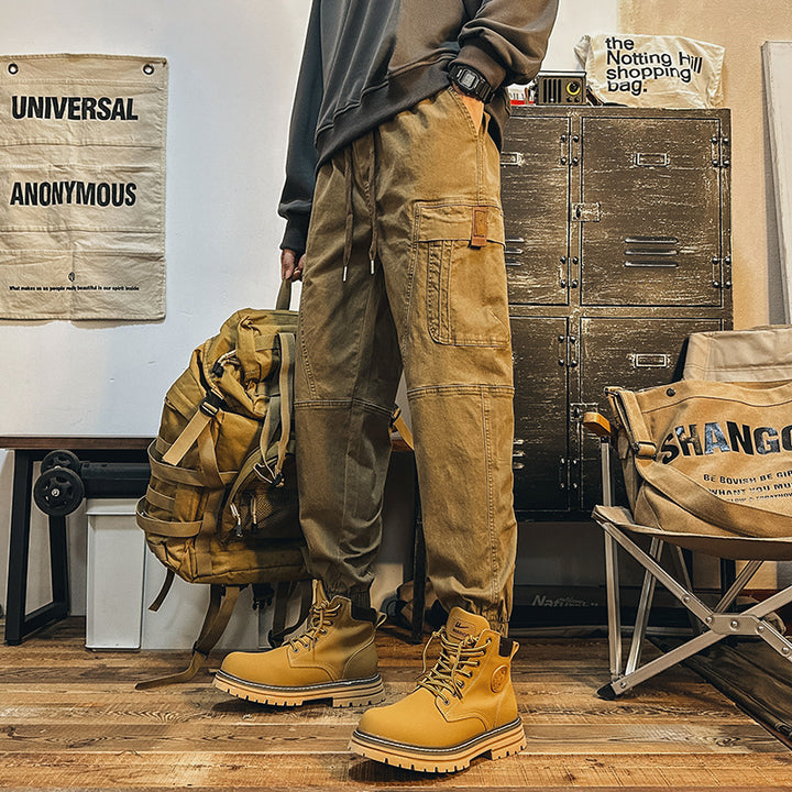 Men's cargo jogger pants with large flap pockets, elastic waistband, and ribbed cuffs Mune Fashion