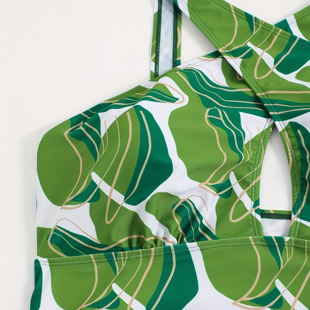 Women's one-piece swimsuit with modern cut and green leaf pattern Mune Fashion