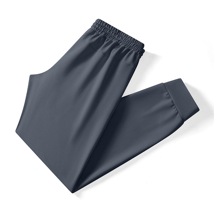 Men's Tech Jogging Pants with elastic drawstring waistband, concealed zipper pockets, and tailored ankle cuffs Mune Fashion