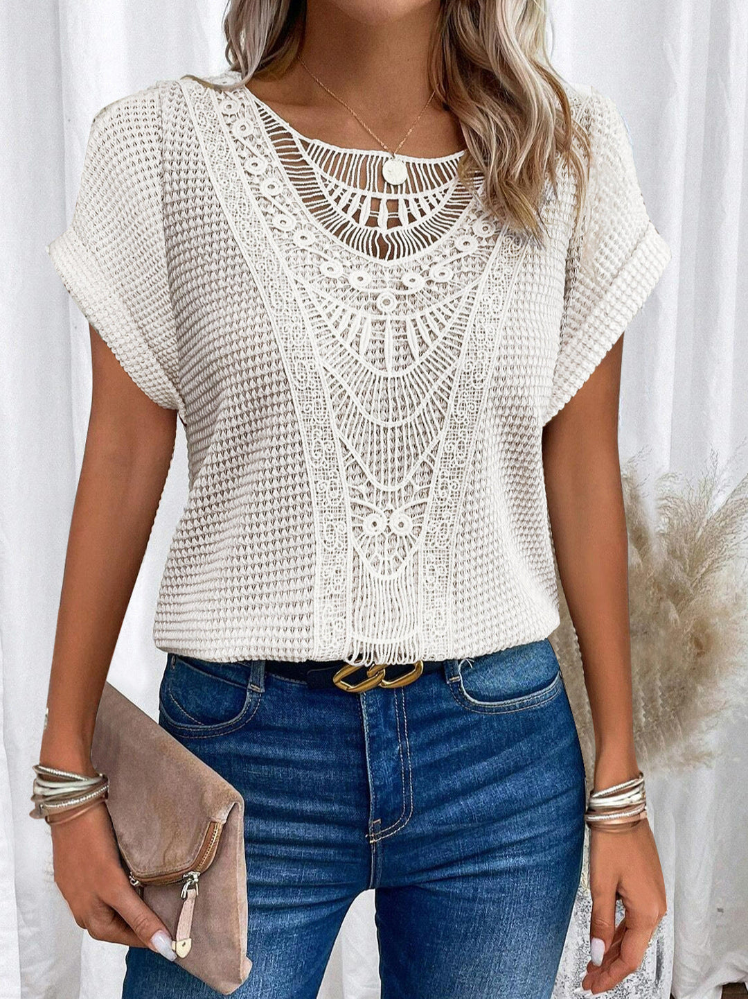Elegant lace T-shirt with stylish details