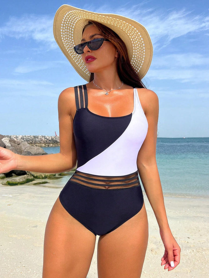 Ladies sporty one-piece swimsuit with innovative cut Mune Fashion
