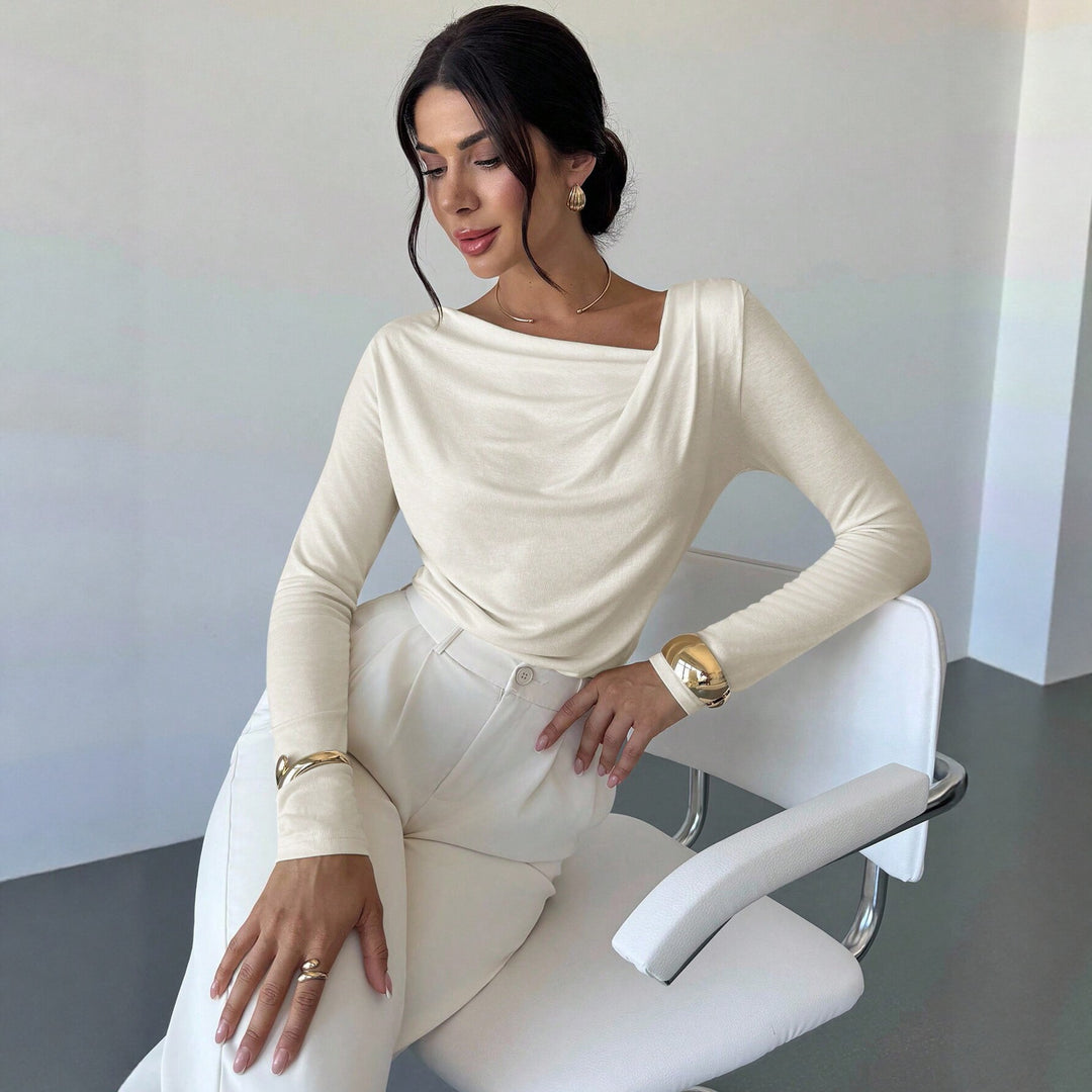 Women's elegant draped long sleeve top with waterfall collar and tailored silhouette Mune Fashion