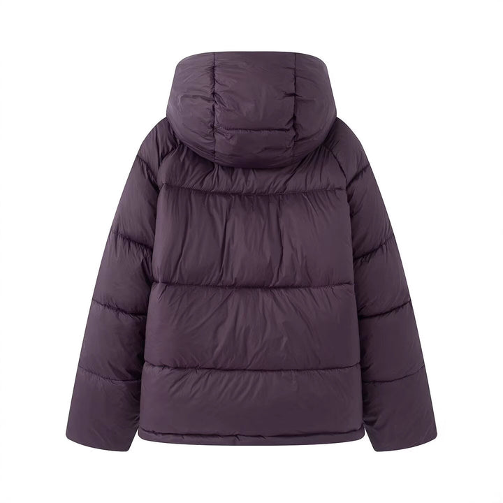 Women's short cut oversized quilted jacket with high collar and hood Mune Fashion