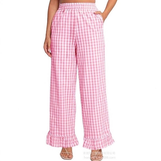 Women's palazzo pants with elastic waistband, side pockets, and ruffled hem Mune Fashion