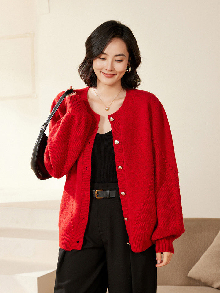 Women's knitted cardigan with textured pattern, balloon sleeves and pearly button placket Mune Fashion