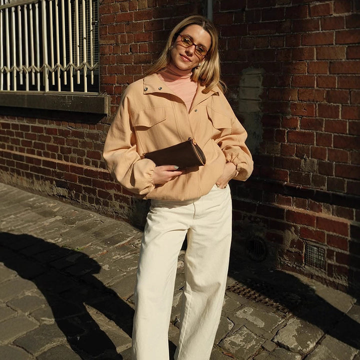 Women's cropped blouson jacket with dropped balloon sleeves, flap pockets, and concealed front placket Mune Fashion