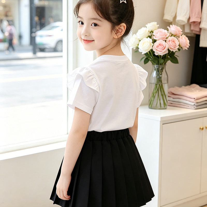 Girl's T-shirt with romantic bow motif and ruffle details Mune Fashion