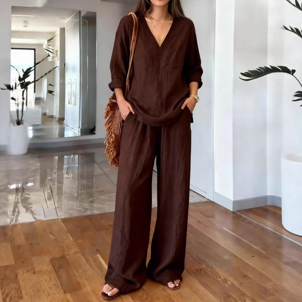 Women's lightweight linen look two-piece set with deep V-neck, loose 3/4 sleeves, and wide palazzo pants cut Mune Fashion