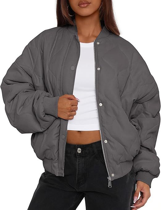 Women's short-cut quilted bomber jacket in oversized look with raglan sleeves Mune Fashion