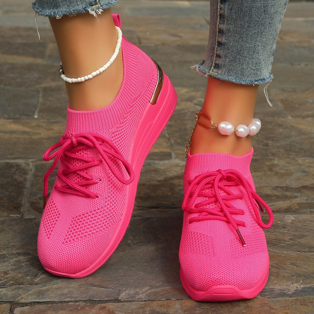 Women’s knit sneakers with wedge sole, sock-like shaft and metallic heel accent Mune Fashion