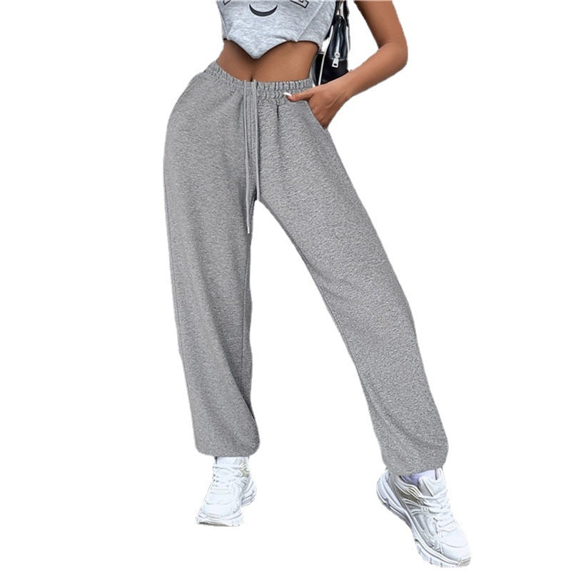 Women's high-waisted jogging pants with side statement print and elastic waistband Mune Fashion