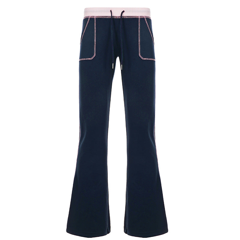 Women nan flared sweatpants with high waistband, drawstring, and contrasting decorative seams Mune Fashion