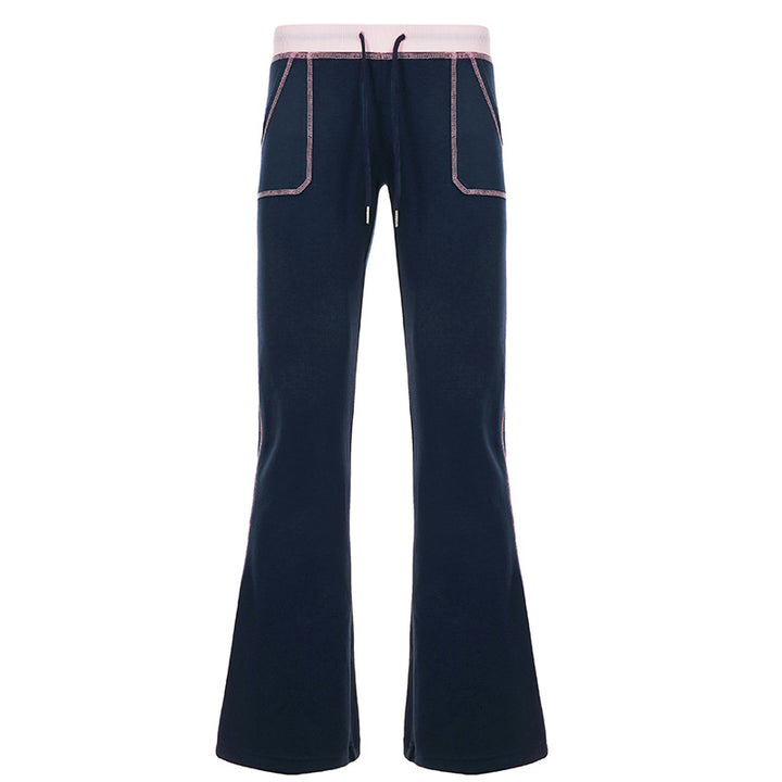 Women nan flared sweatpants with high waistband, drawstring, and contrasting decorative seams Mune Fashion