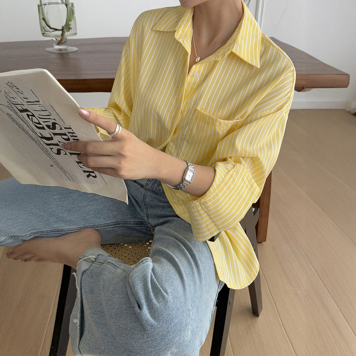 Women's oversized shirt blouse with boxy cut, breast pocket, and rounded hem Mune Fashion