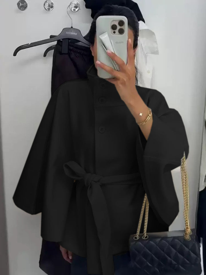 Ladies oversized cape jacket with stand-up collar, concealed button placket and belt Mune Fashion