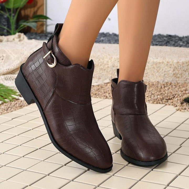 Ladies' western-inspired ankle boots with pointed toe and decorative metal buckle Mune Fashion