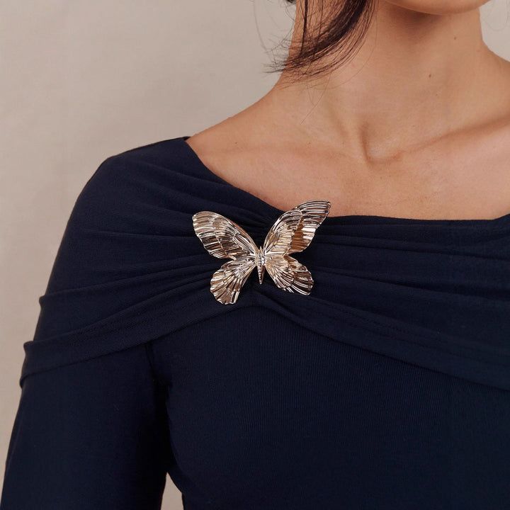 Women off-shoulder draped long-sleeve top with wide shawl collar and detachable decorative brooch Mune Fashion