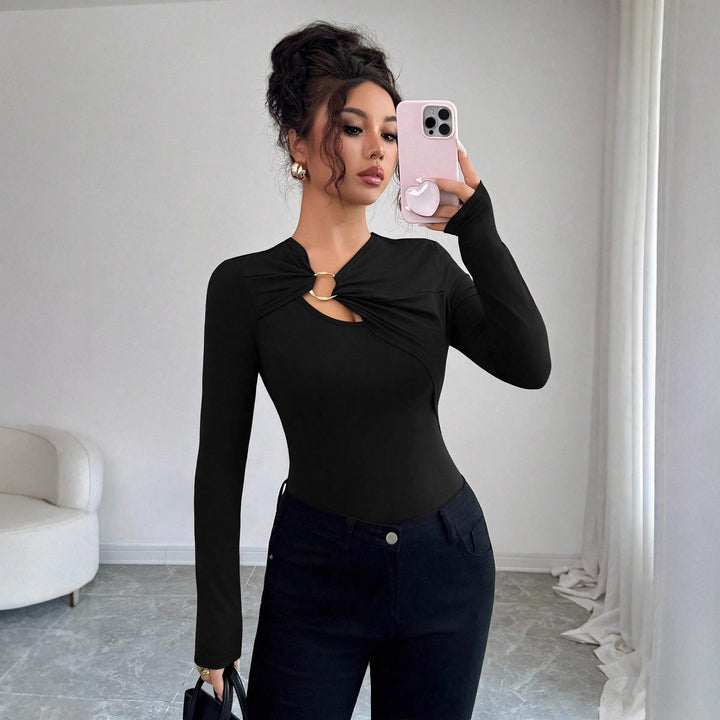 Women's body with figure-hugging long sleeves, leopard print and decorative ring Mune Fashion