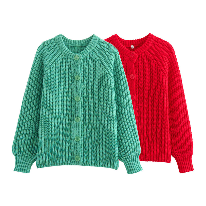 Women's chunky knit raglan cardigan with full button placket, wide cuffs, and relaxed silhouette Mune Fashion