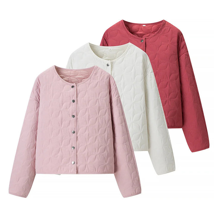 Women's quilted boxy transitional jacket with floral quilted texture, lightly padded inner lining and press stud placket Mune Fashion