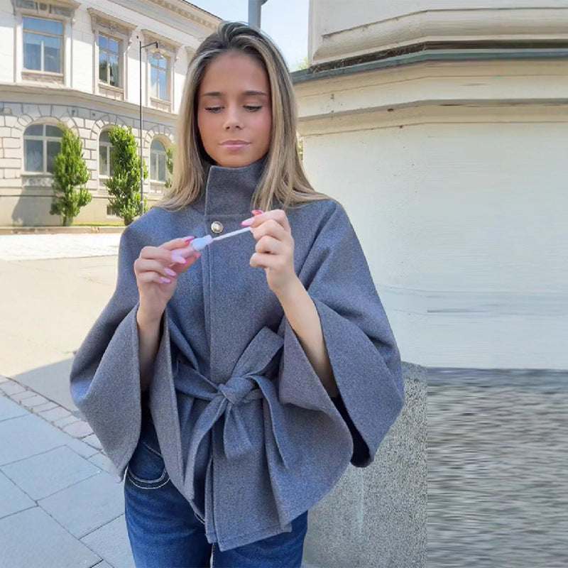 Women's short cape coat made of wool blend with stand-up collar, wide kimono sleeves, and tie belt Mune Fashion