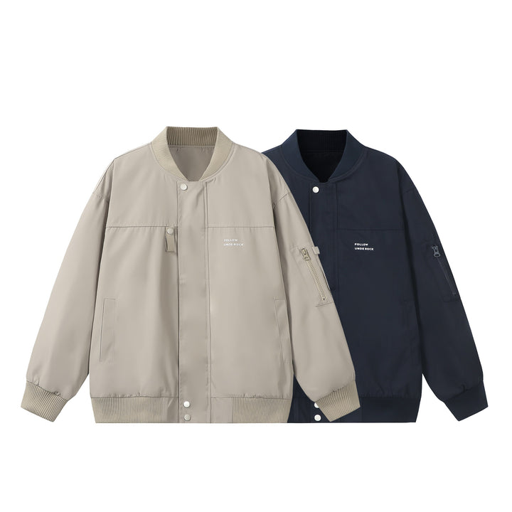 Unisex Short-cut padded bomber jacket with zippered sleeve pocket and ribbed cuffs Mune Fashion