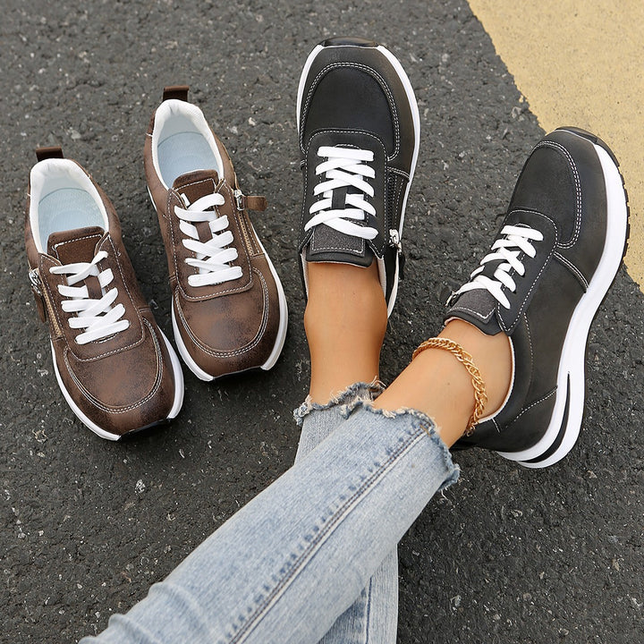 Women’s platform sneaker with zipper detail and padded comfort insole Mune Fashion