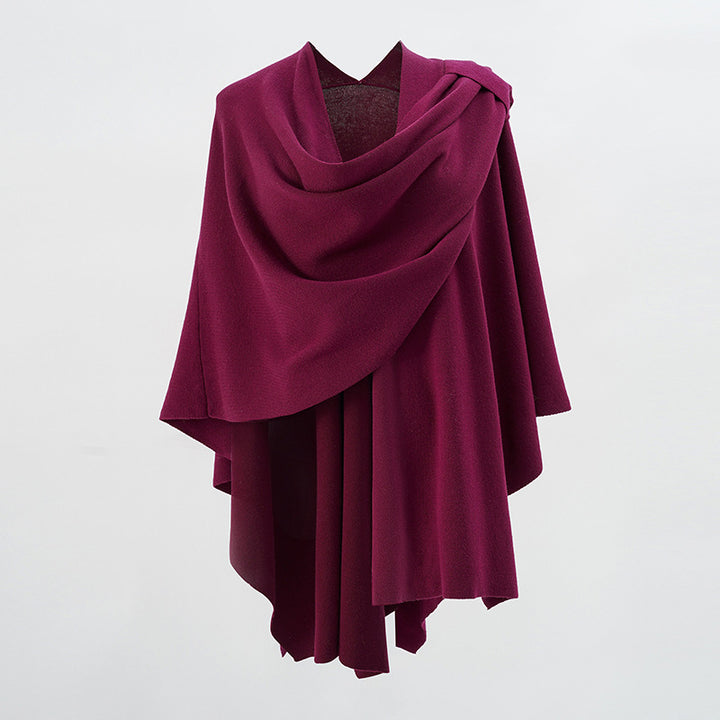 Women's hooded poncho made of fine knit with asymmetric hem Mune Fashion