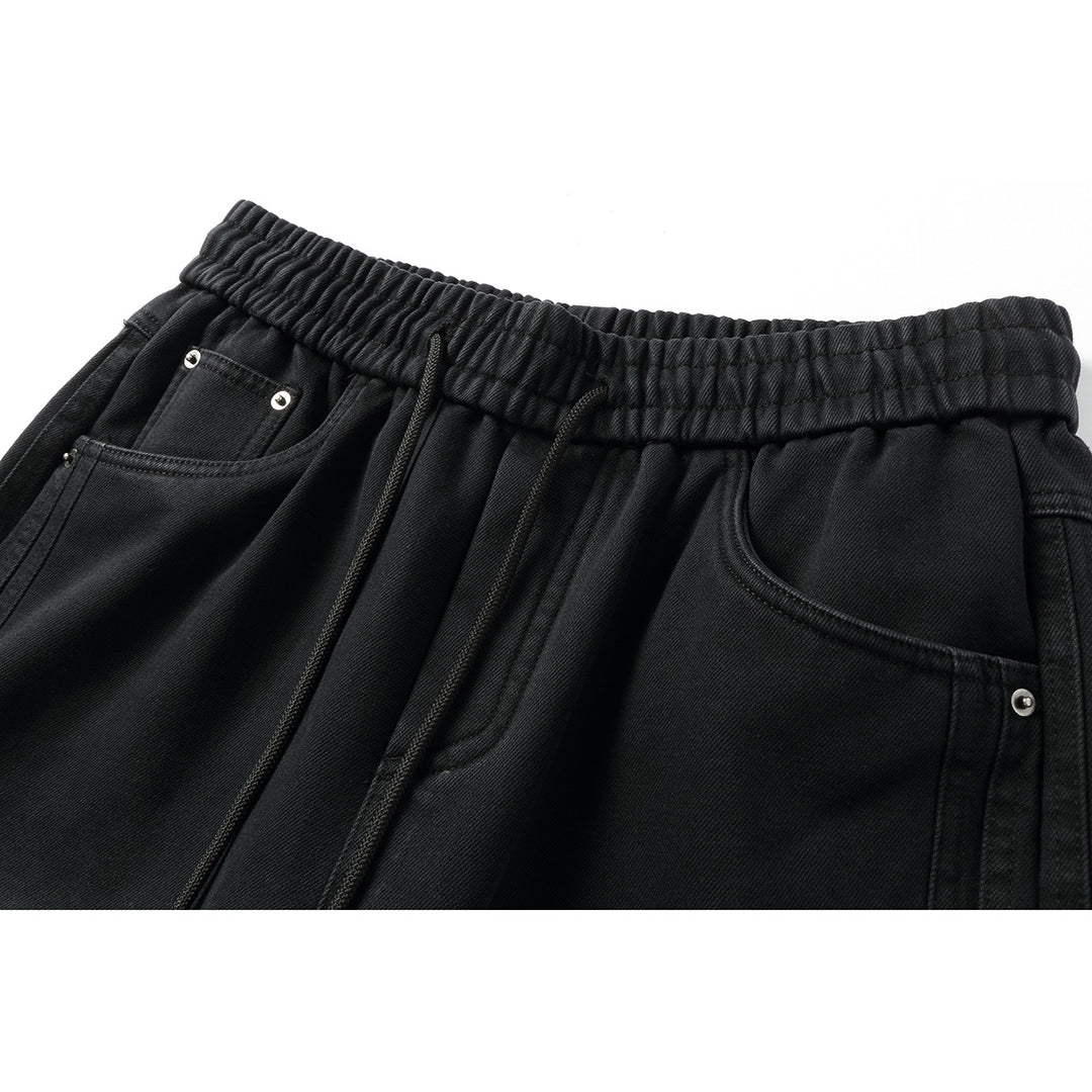 Women's wide high-waisted jeans with elastic waistband, drawstring, and decorative seams Mune Fashion