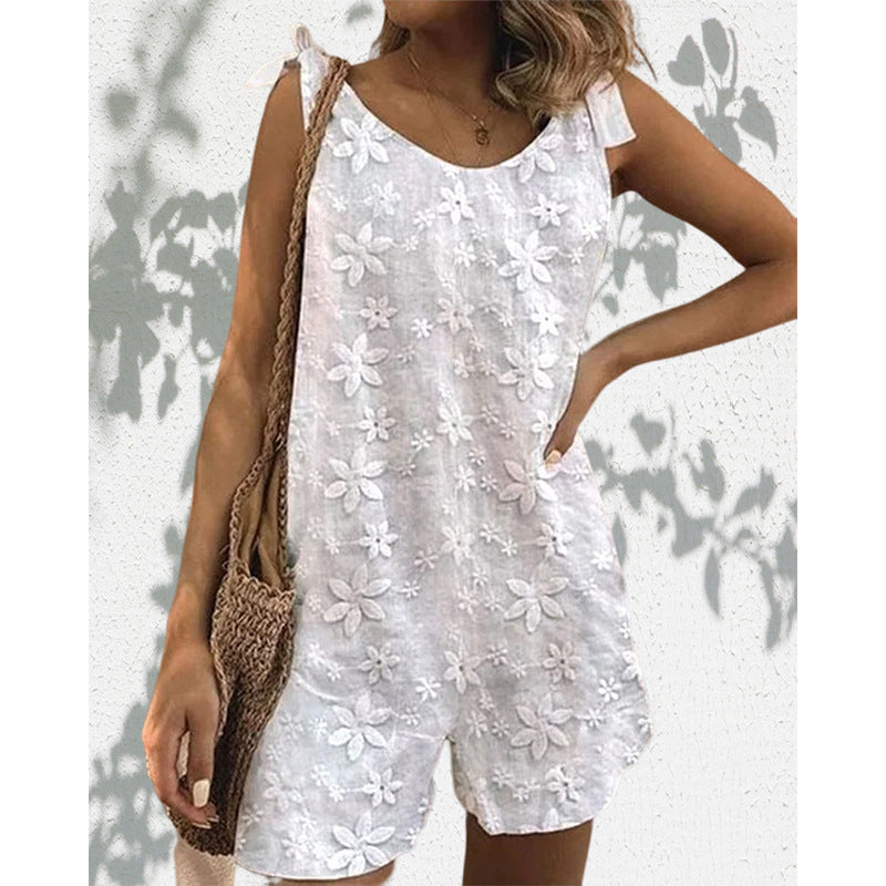 Women's lighter short overall with floral three-dimensional embroidery, adjustable tie straps and loose A-line silhouette Mune Fashion