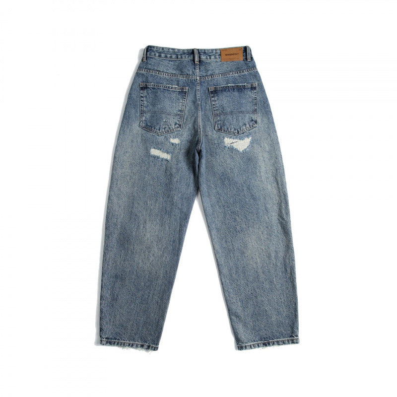 Ladies High-Waist Mom Jeans with wide leg, used wash and destroyed details Mune Fashion