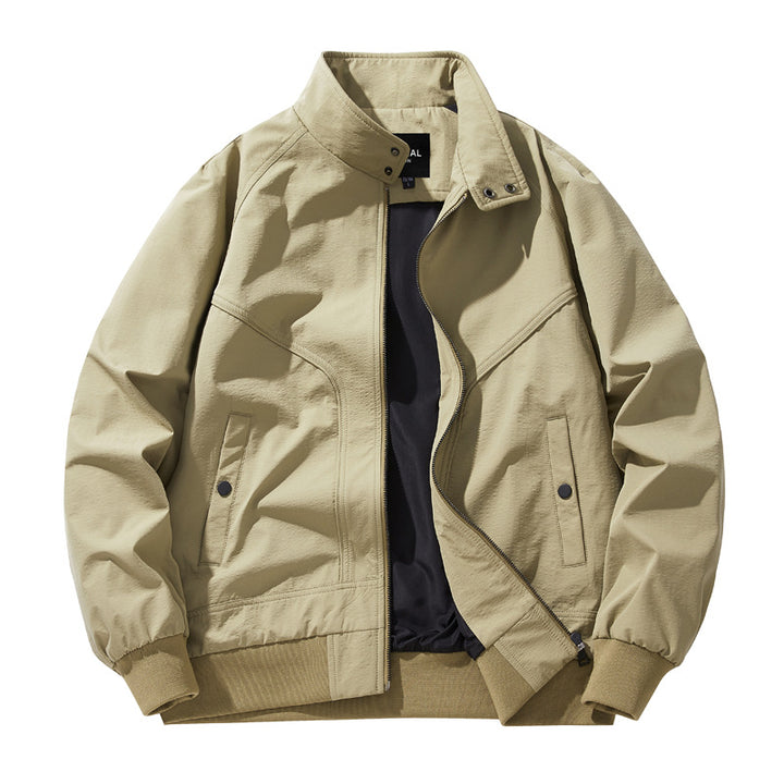 Men lightweight stand-up collar cotton blend bomber jacket with snap button neckline and diagonal seam details Mune Fashion