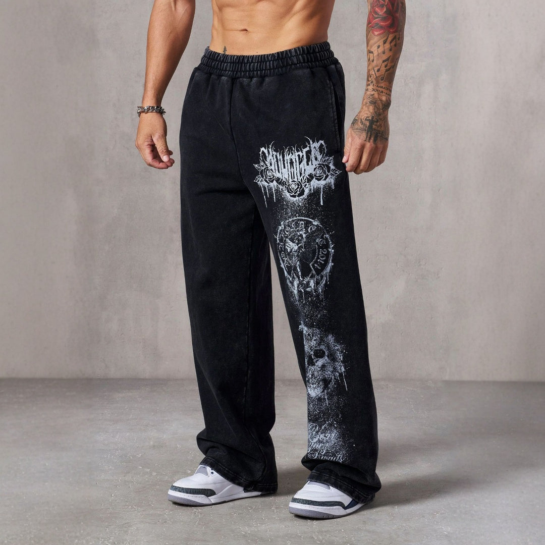 Men's baggy joggers with elastic waistband, side pockets and detailed skull and rose motif Mune Fashion