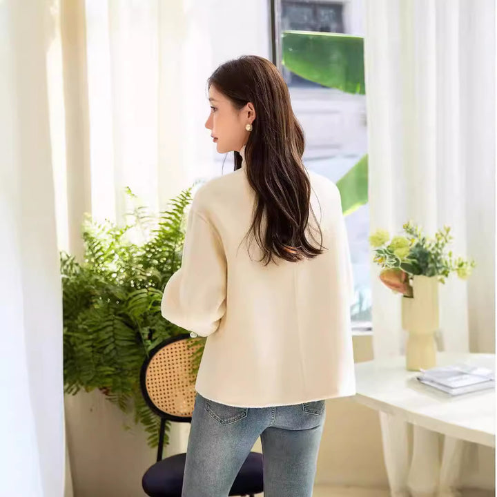 Women's short jacket with stand-up collar, pearl buttons, and contrasting cuffs Mune Fashion