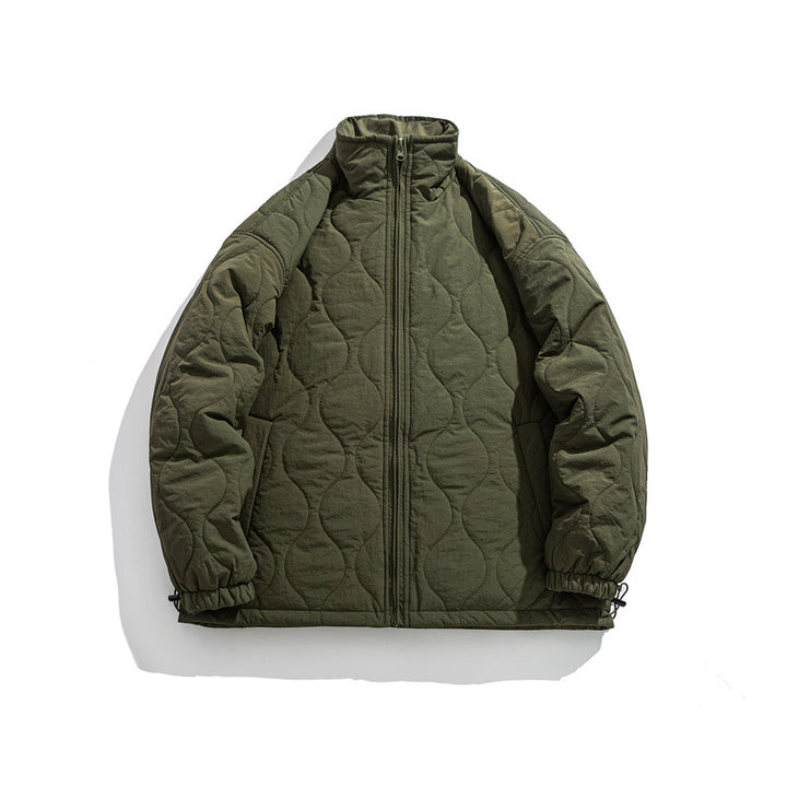 Unisex Boxy quilted jacket in military liner style with high stand-up collar and adjustable hem Mune Fashion