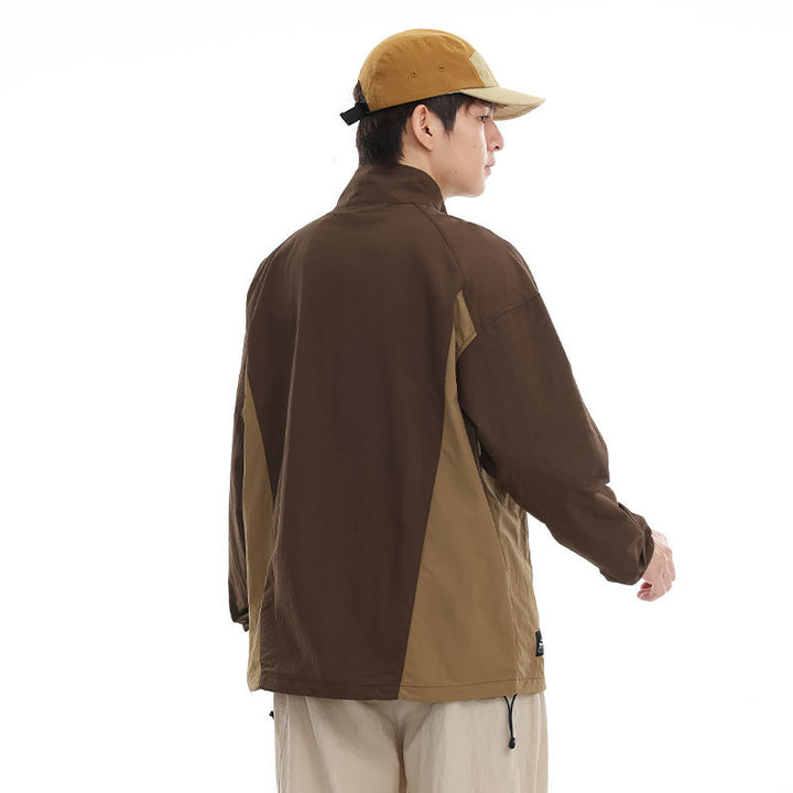 Men's lightweight nylon anorak with half-zip, drawstring hem, and raglan sleeves Mune Fashion