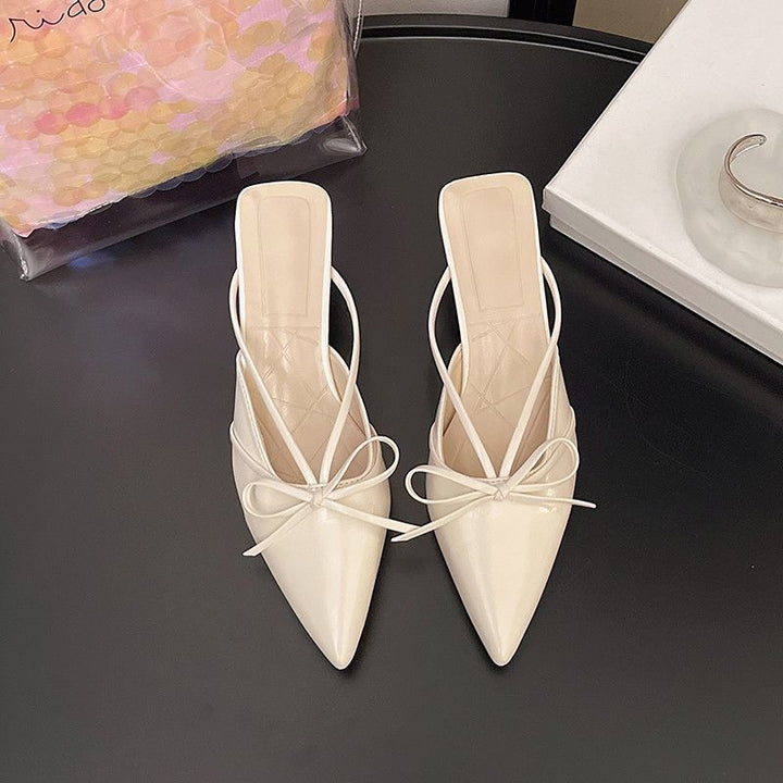 Women's pointed-toe mules with delicate slingback straps and decorative bow Mune Fashion